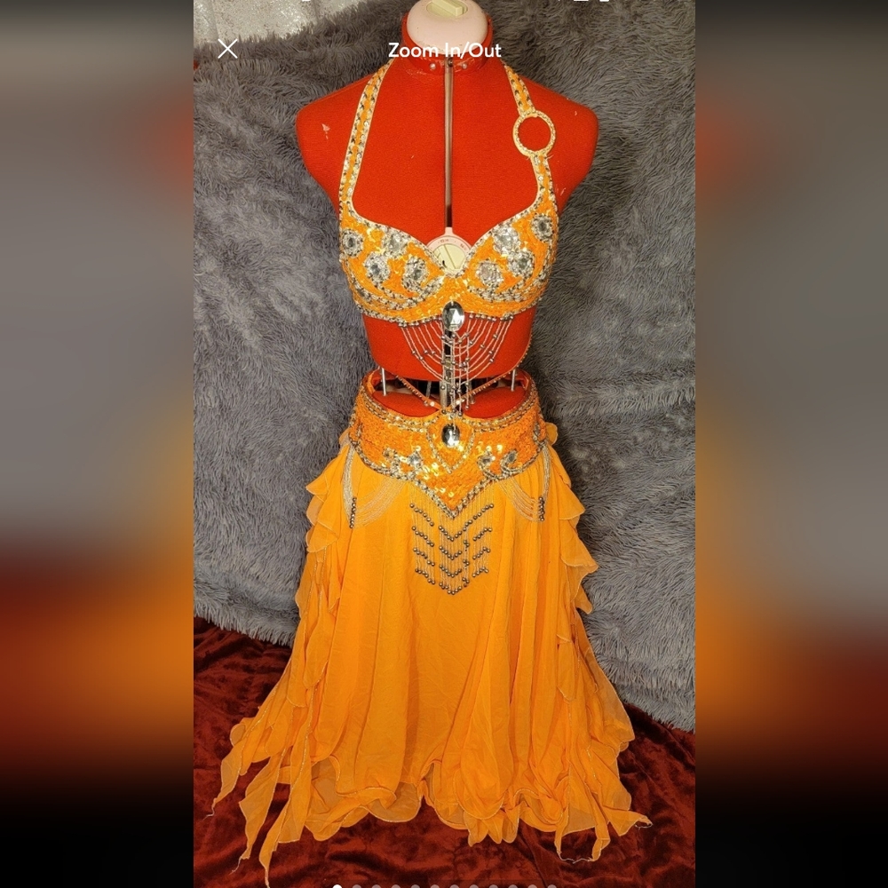 Orange and silver sequin belly dancer dress.